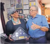  ?? JIM THOMPSON/JOURNAL ?? Shirley and Emmit Dewitt with the flag that was presented to their son, Army Master Sgt. Gary Dewitt. Gary Dewitt served in Iraq near burn pits. He later died of colon cancer his family now believes was linked to the exposure to the pits.