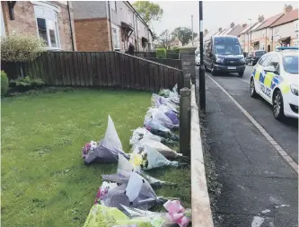  ??  ?? Tributes left in Shrewsbury Crescent, Humbledon.