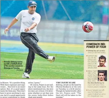  ?? PTI PHOTO ?? Virendra Sehwag warms up with a football ahead of the practice session in Shimoga on Tuesday.