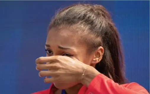  ??  ?? Een gouden medaille maakt emoties los: bij Nafi Thiam...