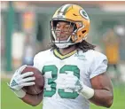  ?? JIM MATTHEWS / USA TODAY NETWORK-WISCONSIN ?? Aaron Jones had 81 carries for 448 yards and four TDs last year.