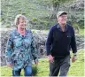  ??  ?? Pleased as punch . . . Kath and Merv Morris, pictured on the Fairfield lifestyle block they look after, say they are overjoyed their lamb has returned.