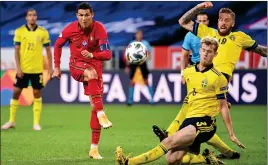  ??  ?? Rangers defender Filip Helander, right, in action for Sweden