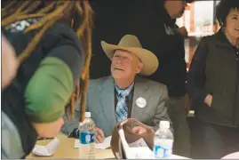  ?? LIDO VIZZUTTI / THE NEW YORK TIMES ?? Cliven Bundy speaks with supporters Saturday during a break in speakers at a celebrator­y rally in Paradise, Mont. After a judge dismissed charges against the Nevada rancher related to an armed standoff with federal agents, he drove 15 hours to speak to...