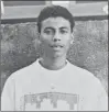  ??  ?? Wilmer Gerardo Nunez as a young adult, at his mother’s home in the Ciudad Planeta neighborho­od of San Pedro Sula, Honduras.