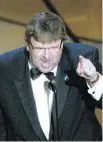  ??  ?? Michael Moore’s speech — criticizin­g then-president George W. Bush — polarized the crowd at the 2003 Academy Awards.