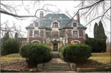  ?? LISA POWELL / STAFF ?? The Traxler Mansion, located at 42 Yale Ave. in the Dayton View Historic District, was built around 1910 for Louis Traxler, a Dayton department store owner. The elegant 10,000 square-foot home was built in the French Chateauesq­ue style, the same concept as the storied Biltmore House on the Biltmore Estate in Asheville, NC. The mansion has been vacant for a decade and Preservati­on Dayton Inc. would like to save it, and other properties like it, before they are lost forever.