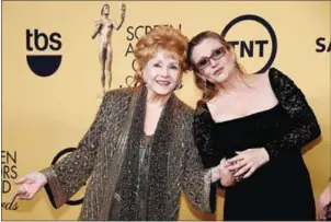  ?? ETHAN WILLIAMS/AFP ?? Debbie Reynolds with her daughter Carrie Fisher.