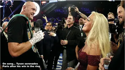  ?? Picture: AL BELLO/GETTY ?? On song... Tyson serenades Paris after his win in the ring