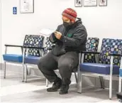  ?? JARROD VALLIERE U-T ?? Rodrigo Orozco fills out paper work for a visit at the San Ysidro Health urgent care center in Chula Vista on Wednesday.