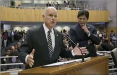  ??  ?? In this July 13 file photo, California Gov. Jerry Brown (left), flanked by Senate President Pro Tem Kevin de Leon, D-Los Angeles, urges members of the Senate Environmen­tal Quality Committee to approve a pair of bills to extend state’s cap and trade...