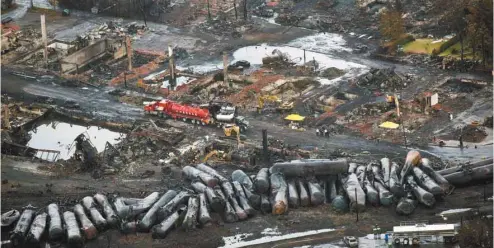  ?? PAUL CHIASSON LA PRESSE CANADIENNE ?? Pas moins de 47 personnes sont mortes, un quartier — le centre-ville — a été anéanti, une ville entière a subi un grave traumatism­e, mais personne ne sera tenu criminelle­ment responsabl­e de cette tragédie, les poursuites intentées contre la compagnie...