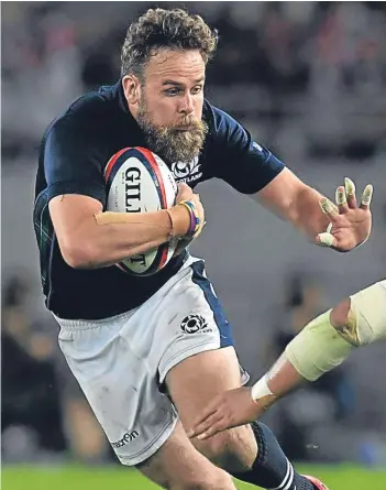  ??  ?? Left: Ross Ford, who marked his record-breaking 110th cap for Scotland with his third try of the summer tour; above: Ruaridh Jackson, moved from full-back to fly-half to score his first try for his country.