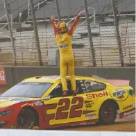  ?? The Associated Press ?? ■ Joey Logano celebrates after winning Monday’s NASCAR Cup Series race in Bristol, Tenn.