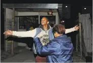  ?? Nasief Manie / Associated Press ?? A South African police officer searches a suspect for guns and drugs during a raid in Cape Town.