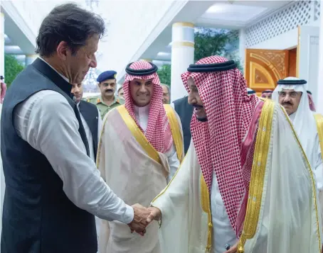  ?? SPA ?? King Salman receives Pakistani Prime Minister Imran Khan who arrived in Jeddah on Thursday. Both leaders discussed the current developmen­ts in the region.