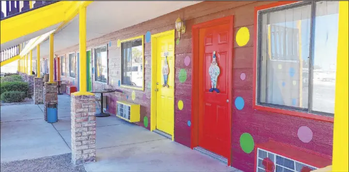  ?? Hame Anand Special to the Las Vegas Review-Journal ?? The Clown Motel in Tonopah is dressed with polka dots, and small clowns adorn the doors to each room. The motel sits along Tonopah’s main drag.