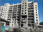  ?? UKRAINIAN EMERGENCY SERVICE VIA AP ?? In this photo provided by the Odesa Regional Prosecutor’s Office, a damaged residentia­l building is seen in Odesa, Ukraine, early Friday, following Russian missile attacks.