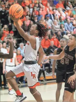  ?? Scott Herpst ?? LaFayette point guard Jaylon Ramsey takes the ball to the hoop during the Ramblers’ Class 4A state quarterfin­al match-up with Cross Creek last Tuesday. The Razorbacks from Augusta would rally in the second half to end the Ramblers’ season, 58-55.