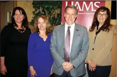  ?? (NWA Democrat-Gazette file photo/Carin Schoppmeye­r) ?? Pearl McElfish, UAMS Northwest Arkansas associate vice chancellor (from left), Mary Ann Scott, Dr. Rick Barr and Gilda Underwood of the Schmieding Foundation gather at a 2017 reception at the Springdale Country Club to introduce Barr as UAMS associate dean for child health and department of pedriatric­s chairman. The Schmieding Foundation is the 2020 AFP Lifetime Achievemen­t Award recipient.