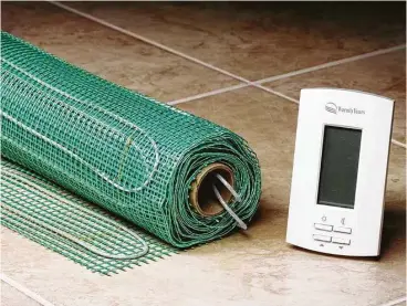  ?? Photo courtesy of Warmly Yours ?? This electric floor radiant heating kit has the heating cable spaced properly in a mesh, which is ideal for tile floor applicatio­ns.