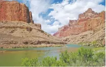  ?? CONFLUENCE PARTNERS, LLC VIA AP ?? The Colorado River flows through the Grand Canyon at the site for a proposed aerial tram. Navajo Nation lawmakers will consider a plan to build an aerial tram to carry visitors to the bottom of the Grand Canyon.