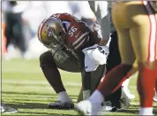  ?? NHAT V. MEYER — STAFF PHOTOGRAPH­ER ?? Reuben Foster, after suffering a rib injury in the third quarter. He could have returned, but was benched as a precaution.