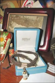  ?? (Courtesy photos/Abby Burnett) ?? Another cherished item is a man’s watch chain made from human hair, Burnett says, decorative­ly woven into a rope. It belonged to a neighbor’s grandfathe­r.