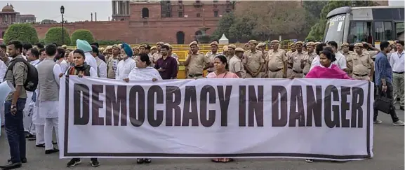  ?? Photo: AP ?? Lawmakers from India’s opposition parties protest against the government of Prime Minister Narendra Modi outside the parliament in New Delhi, India, on March 24, 2023.