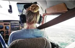  ?? Washington Post ?? After Alexandra Jackson, shown flying over Maryland, joined the Air National Guard, she learned she would need a height waiver to fly two types of planes.