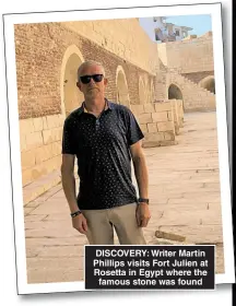  ?? ?? DISCOVERY: Writer Martin Phillips visits Fort Julien at Rosetta in Egypt where the famous stone was found