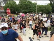  ?? EVAN BRANDT — MEDIANEWS GROUP ?? Marchers stream up Main Street in Phoenxivil­le Friday and pour into Reeves Park for a rally against racial injustice and police violence.