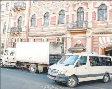  ??  ?? A minibus leves a building of the US Consulate in Saint Petersburg. — AFP photo