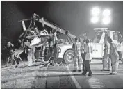  ?? Timothy Jacobsen Associated Press ?? THE WRECKAGE of an R-44 is removed from along Interstate 70 in Maryland in 2009. All aboard died.