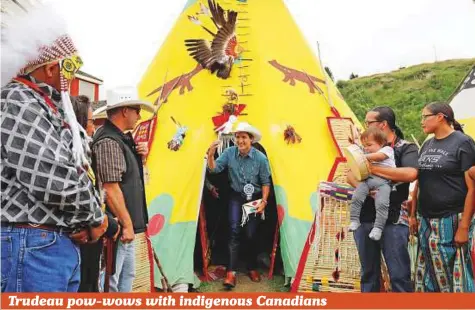  ?? Reuters ?? Canadian Prime Minister Justin Trudeau comes out of a teepee at the Calgary Stampede in Alberta on Saturday.