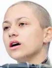  ?? AP ?? Emma Gonzalez, a survivor of the mass shooting at Marjory Stoneman Douglas High School , speaks at Saturday’s March for Our Lives in Washington, D.C.