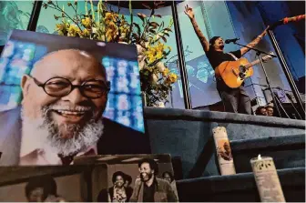  ?? Carlos Avila Gonzalez/The Chronicle ?? Michael Franti sings a tribute to the Rev. Cecil Williams during Sunday’s celebratio­n of his life at Glide Memorial Church in San Francisco. Williams died April 22 at 94.