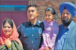  ?? PHOTO CREDIT: BABUSHAHI.COM ?? Mittan Katoch, 26, who joined the police department in Indianapol­is, capital of the US state of Indiana, with his family.