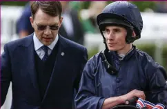  ??  ?? Free at last: Aidan O’Brien (left) and jockey Ryan Moore