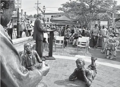  ?? PAUL W. GILLESPIE/CAPITAL GAZETTE PHOTOS ?? Chris Haley, nephew of Alex Haley, gives remarks Saturday as Annapolis commemorat­ed the journalist and author in honor of his 100th birthday with an Alex Haley Day public ceremony at City Dock.