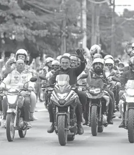  ?? ?? misma ciudad, Bolsonaro lideró a un grupo de motociclis­tas