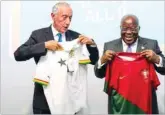  ?? ?? Portugal President Marcelo Rebelo de Sousa and Ghana’s President Nana Akufo-Addo exchange jerseys of their national football teams.