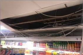  ??  ?? The damaged ceiling of Hayes Daybreak supermarke­t in Campile.