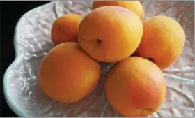  ?? EMILY RYAN — FOR DIGITAL FIRST MEDIA ?? Apricots are easy to enjoy on their own or in recipes.