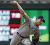  ?? BRUCE KLUCKHOHN - THE ASSOCIATED PRESS ?? New York Yankees relief pitcher Tommy Kahnle throws to the Minnesota Twins in the eighth inning of a baseball game Wednesday, in Minneapoli­s.