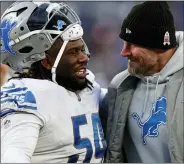  ?? ASSOCIATED PRESS FILE PHOTO ?? Can coach Dan Campbell, right, Alim McNeill and the Detroit Lions still make the playoff this season?