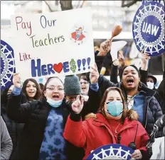  ?? Tyler Sizemore / Hearst Connecticu­t Media ?? Child care workers demonstrat­e in March in Stamford calling for the state to support higher wages in the industry.