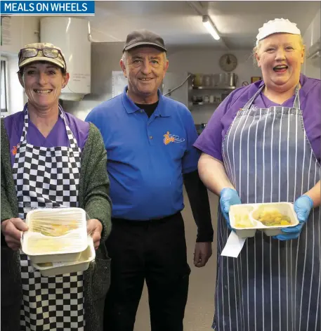  ??  ?? Noeleen Cahill, David Dunne and Siobhan Doyle hard at work in the kitchen at St Louis Daycare Centre preparing dinners for their Meals On Wheels service for the elderly, and invaluable service at this time of need.