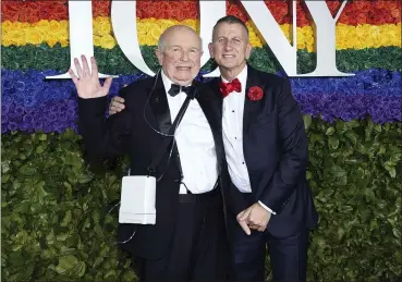  ?? PHOTO BY EVAN AGOSTINI — INVISION — AP, FILE ?? Terrence McNally, left, and Tom Kirdahy pose June 9at the 73rd annual Tony Awards in New York. McNally, one of America’s great playwright­s whose prolific career included winning Tony Awards for the plays “Love! Valour! Compassion!” and “Master Class” and the musicals “Ragtime” and “Kiss of the Spider Woman,” died March 24of complicati­ons from the coronaviru­s. He was 81.