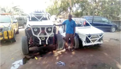  ??  ?? Alex Abari with his “crazy Crocodile” car